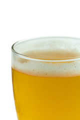 glass of beer with foam isolated on white