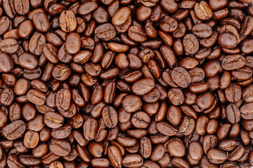 closeup arabica coffee beans. roasted coffee beans background.