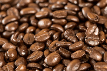 closeup arabica coffee beans. roasted coffee beans background.