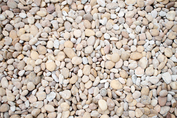 White pebbles Stone texture background.