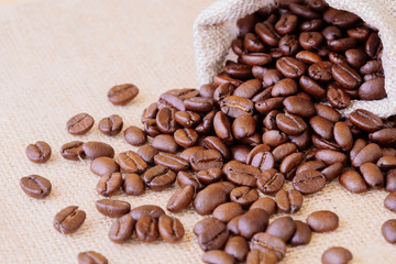 brown arabica coffee beans with coffee sack