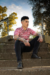 Obraz premium male model with mustache and barber tattoos