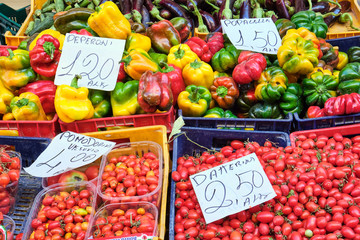 Cherry tomatoes and bell pepper for sale at a market in Naples, Italy