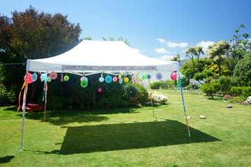 Birthday Marquee on Lawn,  Sunny Day