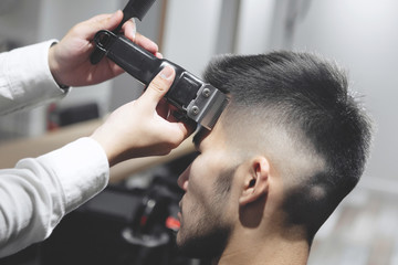 Fototapeta premium Handsome Young Hairdresser.