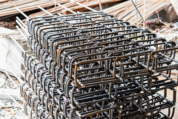 Stack of shape reinforcing steel bars for building structure armature.