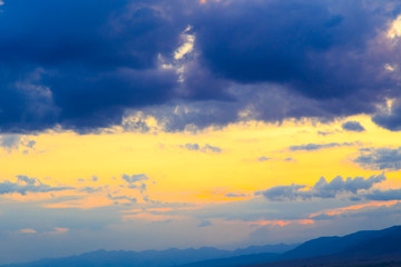 Obraz premium Bright cumulus clouds against the blue sky. Sunset sky Natural background