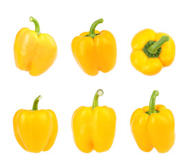 Set of fresh yellow bell peppers on white background