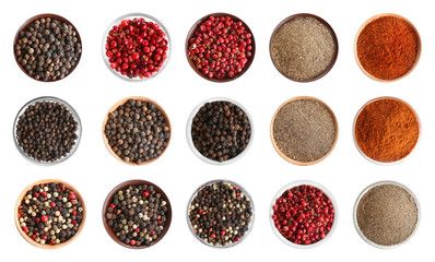 Set with different ground peppers and corns on white background, top view