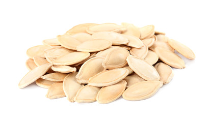 Pile of raw pumpkin seeds on white background