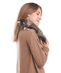 Young woman with cat on white background. Owner and pet