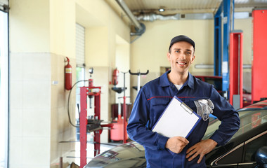Male mechanic in car service center