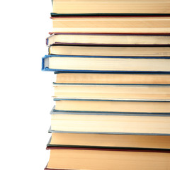 Stack of hardcover books on white background