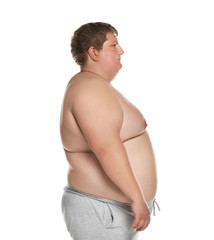 Portrait of overweight man posing on white background