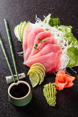 sashimi on the black background
