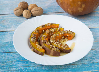 Pumpkin baked in the oven with honey and walnuts