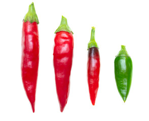 Red and green chili peppers isolated on a white background