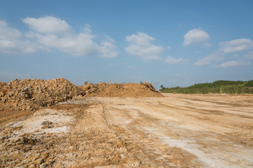 Outdoor construction dirt road mound and sky landscape