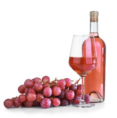 Obraz premium Glass and bottle of tasty wine on white background