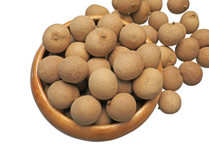 longan, or Euphoria longana in wooden bowl isolated on white background.