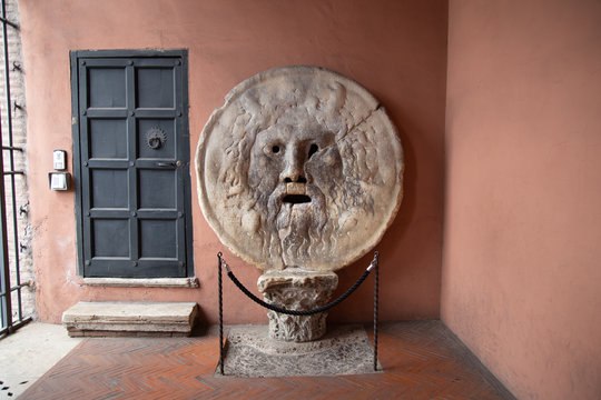 Horizontal picture of old object The Mouth of Truth (Bocca della Verita) , located in Rome, Italy