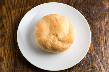 bun baking on a white plate or in a transparent bag on a white background