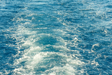 motorboat foam trace wave on the ocean water splash