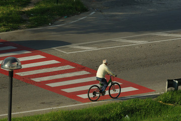   Red crosswalk and bicycles in Termoli, Molise, Italy