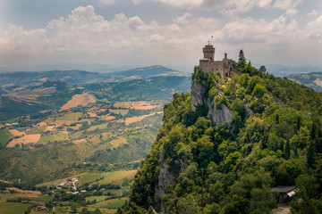 Fototapeta na wymiar Panoramic view of Guaita Tower and rural area surrounded San Marino