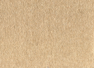 Light beige cashmere fabric.Herringbone tweed, Wool Background Texture. Expensive men's suit of...