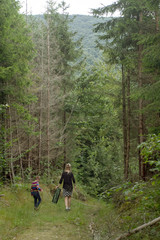 Mother and son in the forest