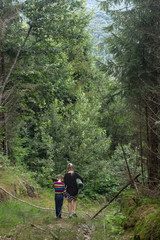 Fototapeta na wymiar Mother and son in the forest