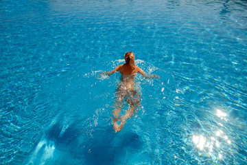 Woman in the swimming pool