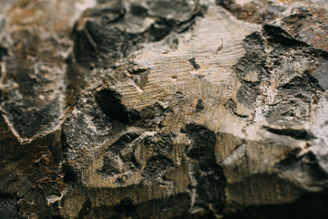 Natural rock wall texture and background. Closeup view of stone wall texture and background.