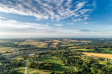 A small European city, summer evening. A bird's-eye view