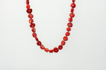Red coral necklace on white backgrounds
