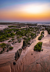 Rock formations by the beach at Monte Clerigo, Algarve (Portugal)