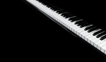 Piano and Piano keyboard with black background.