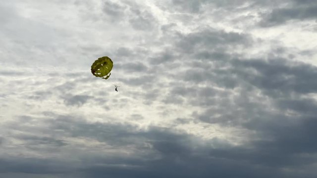 Tourist of Parasailing boat in the sea extreme active vacation.