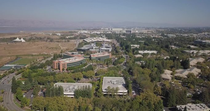 Aerial of Google HQ with solar panels on the roof in mountain view california fly forward