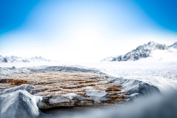 Blurred snowy winter background with shimmering snow.