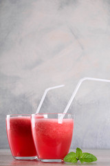 Watermelon smoothie on wood background , healthy drink. Summer. Watermelon pieces. 