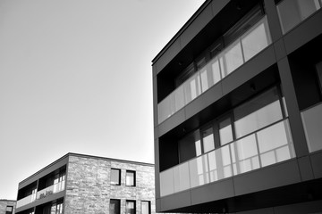 Modern apartment buildings. Facade of a modern apartment building. Black and white.