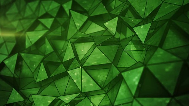 Layered green glossy low poly mesh. Abstract 3D render of futuristic sci-fi construction. Seamless loop smooth animation rendered with DOF 4k UHD (3840x2160)