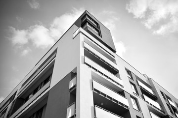 Modern apartment buildings. Facade of a modern apartment building. Black and white.