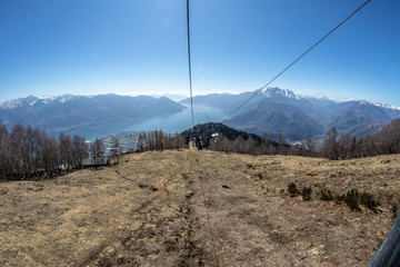 Cableway in switzerland mountains, monte bre