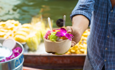 Coconut  ice cream in floating market ratchadamnoen Thailand