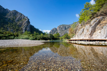 Fototapeta premium View on the ancient ruins of Lycian town of Olympos, Turkey.