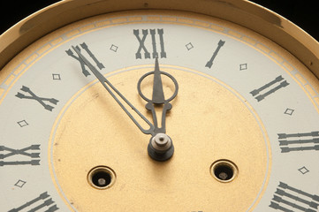 Old clock with roman numerals.