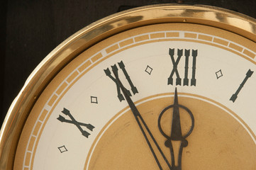 Obraz na płótnie Canvas Old clock with roman numerals.